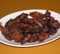 Geroerbakte lamshaasjes met Szechuan woksaus en peultjes